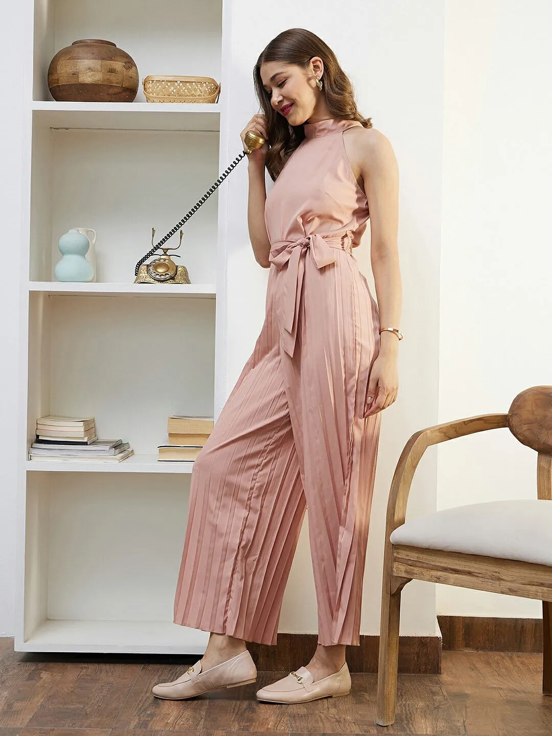 Berrylush Women Solid Light Pink Halter Neck Sleeveless Waist Tie-Up Pleated Culotte Jumpsuit