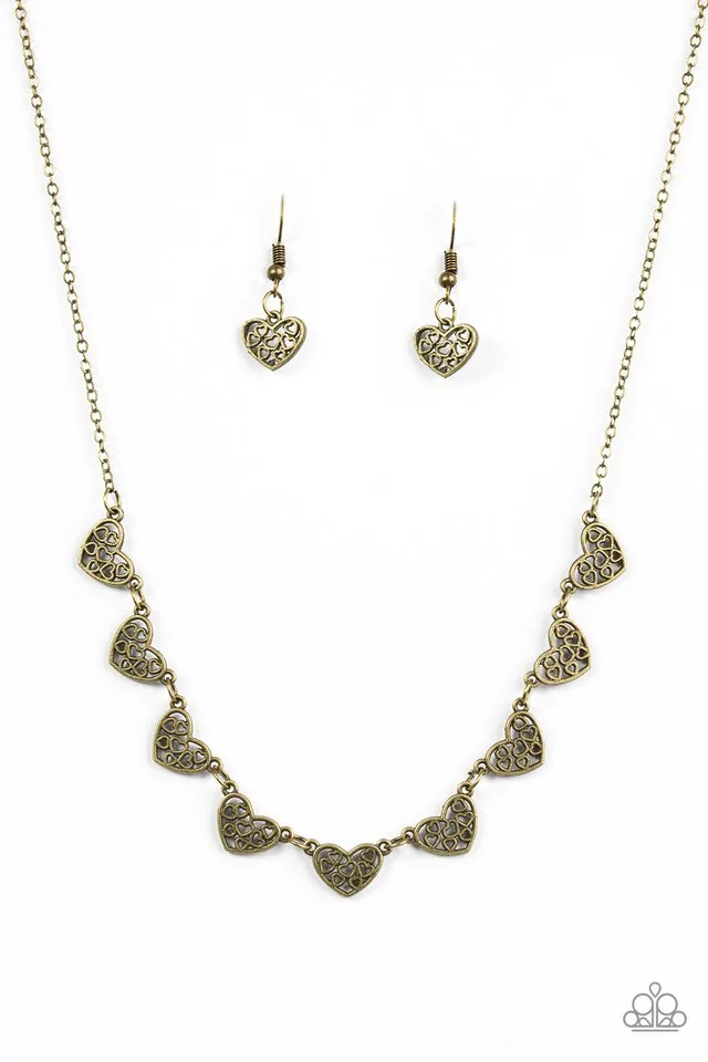 Paparazzi Accessories  - Love And Devotion #N922 Peg - Brass Necklace