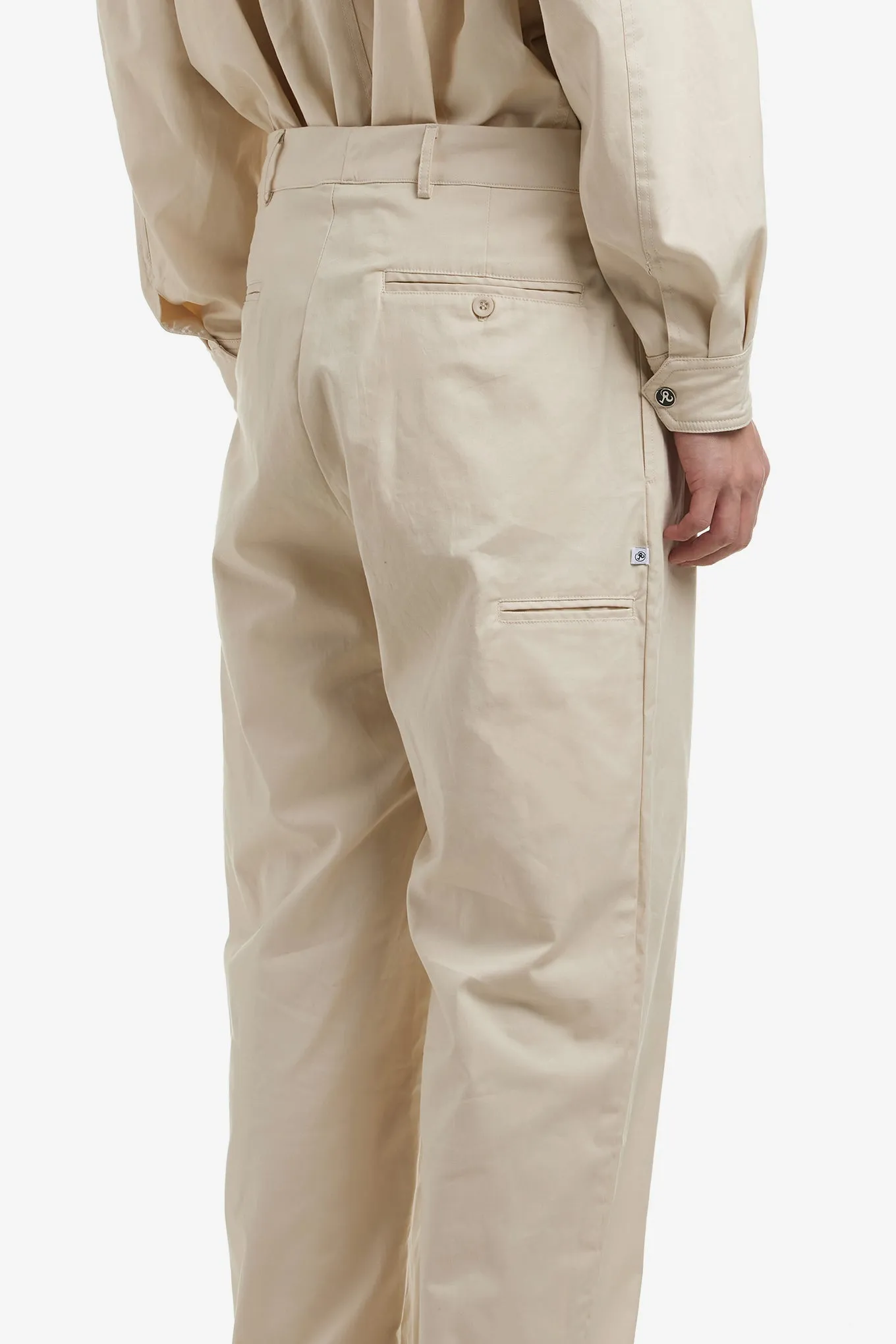 PLEATED CHINOS