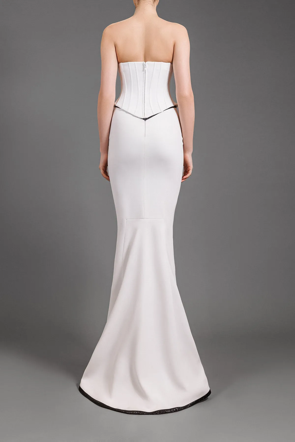 White crêpe structured corset with a mermaid skirt and black shimmery detailing